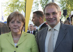 Dr. Brian Fera mit Bundeskanzlerin Dr. Angela Merkel